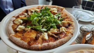 A plate with full-sized healthy pizza in East Brunswick, NJ